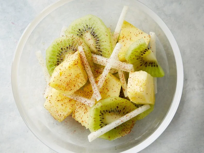 Food Network Kitchenâ  s Pineapple, Kiwi, Jicama and Chile Powder fruit salad as seen on Food Network.