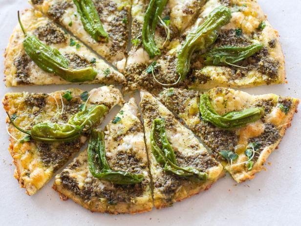 Jackie Alpers' green pizza for St. Patrick's Day or spring parties with pesto, peppers and micro greens, Recipe and food photography by Jackie Alpers for the Food Network.