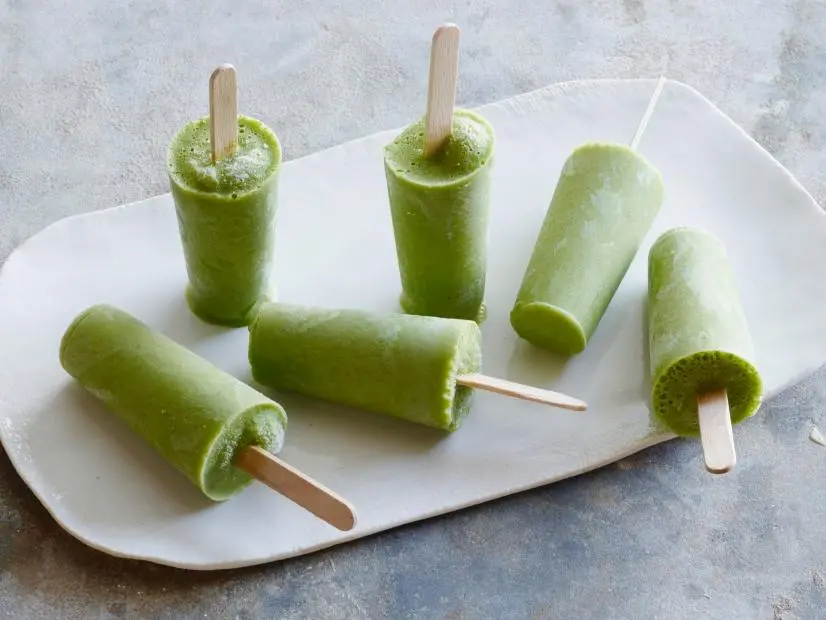 FNK KALE-Â­BANANA BREAKFAST POPS, Food Network Kitchen, Banana, Kale, GreekYogurt, Maple Syrup, Oranges, Lemon, Ginger, Frozen Pop Molds