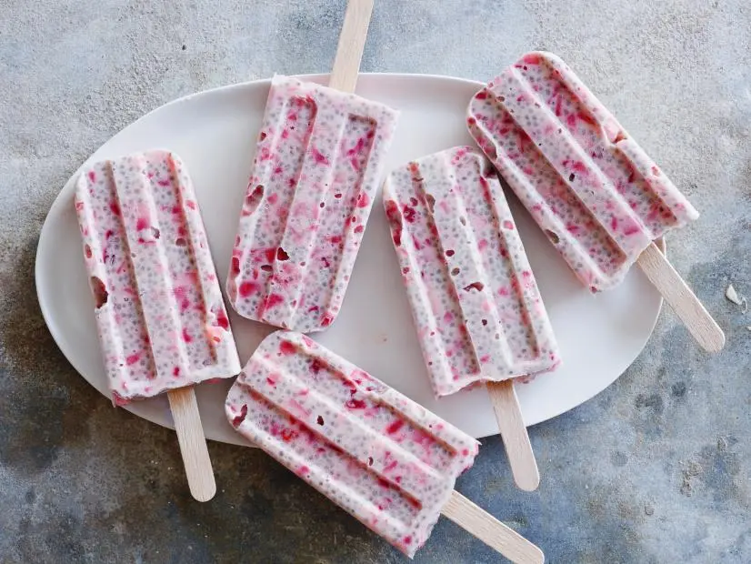 FNK STRAWBERRY-Â­CHIA BREAKFAST POPS, Food Network Kitchen, Evaporated Milk,Lime, Honey, Chia Seeds, Strawberries, Frozen Pop Molds