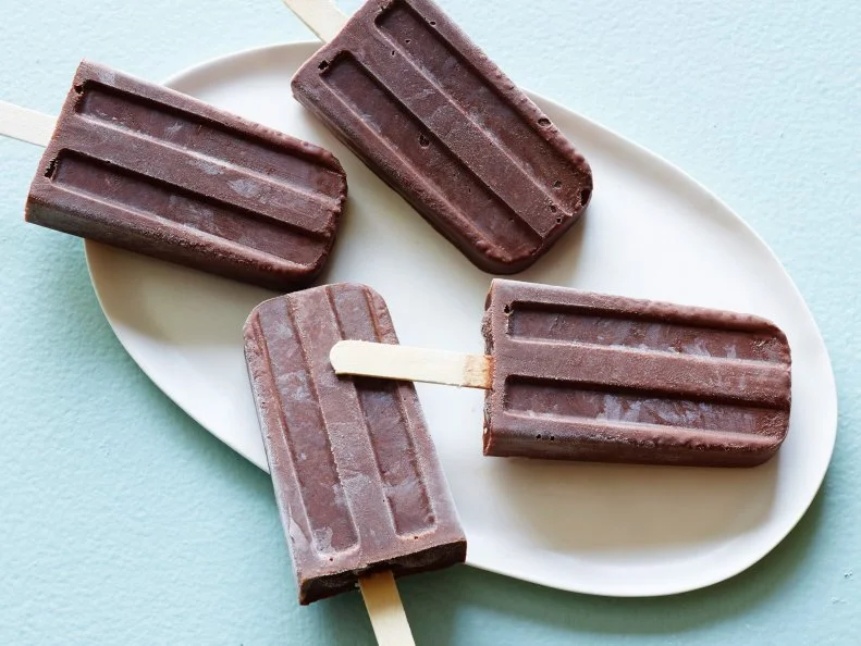 FNK HEALTHY CHOCOLATECHIA
PUDDING POPS, Food Network Kitchen, Milk,
Semisweet
Chocolate, Unsweetened Cocoa Powder, Agave Nectar, Chia Seeds, Vanilla
Extract