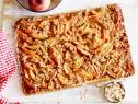 FNK PEACH STREUSEL SLAB PIE, Food Network Kitchen, Allpurpose
Flour,
Unsalted Butter, Confectioners’ Sugar, Peaches, Light Brown Sugar, Lemon,
Cornstarch, Vanilla Extract, Cinnamon, Nutmeg, Almonds