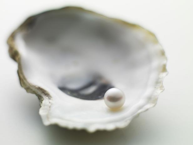 Woman Bites Into Oyster, Finds 51 Pearls
