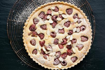 https://food.fnr.sndimg.com/content/dam/images/food/fullset/2015/5/16/0/FN_seneviratne-raspberry-frangipane-tart-recipe_s4x3.jpg.rend.hgtvcom.406.271.suffix/1432673386806.jpeg