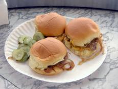 The Slider Burgers with Cheese and Onions served at this Hackensack fixture are a favorite of both Alex Guarnaschelli and Guy Fieri (who said he could eat “18 or 75” of them). These three-bite beauties feature griddled patties cooked with thin-sliced onions and served beneath a blanket of melty American cheese. Michael Psilakis likens these sliders to “tiny hockey pucks of joy.”