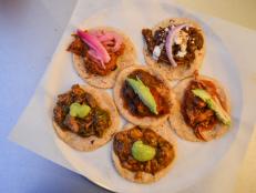 At this Los Angeles taqueria, tender, slow-cooked meats are piled into freshly pressed corn tortillas, which Aaron Sanchez said "burst with corn flavor." He and Roger Mooking recommend the "spiciest taco on the menu" -- cochinita pibil -- which customers can order on a spiciness scale of 1 to 10.