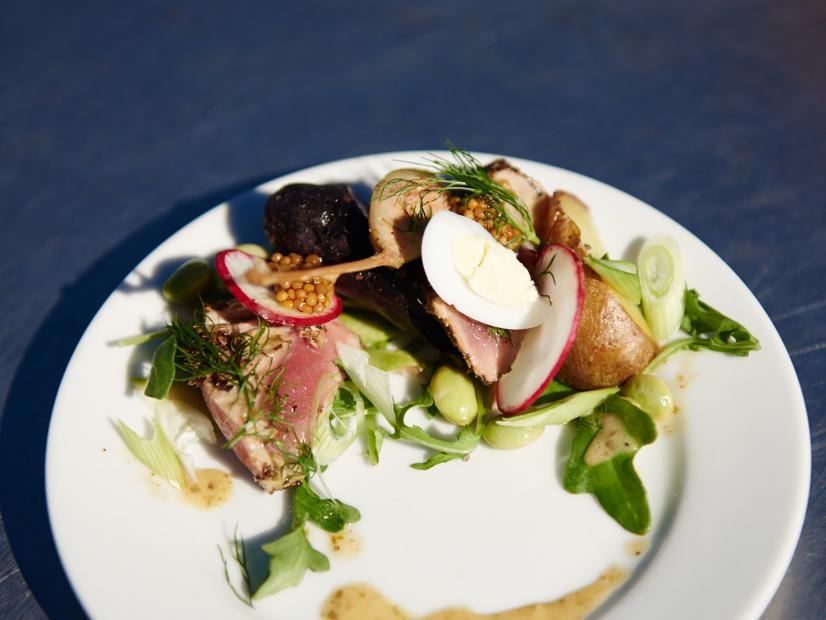 Finalist Arnold Myint's dish, Seared Tuna Salad with Heirloom Potatoes and Smoked Caper Vinaigrette, for the Star Challenge, Food Star Showcase, as seen on Food Network Star, Season 11.