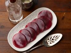Add a shot of cheer to your jellied cranberry sauce with Food Network's Spiked Jellied Cranberry Sauce recipe, spiked with vodka and orange liqueur.