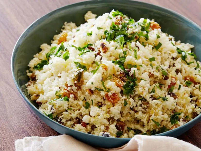 HEALTHY SICILIAN CAULIFLOWER RICE, Food Network Kitchen, Food Network, GoldenRaisins, Cauliflower, Olive Oil, Onion, Almonds, Capers, Garlic, Lemon, Pepper Flake,Parsley