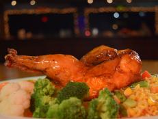 Feast on a three-course meal while being entertained by swashbuckling pirates who vie for your attention with acrobatic stunts. The action takes place aboard a 46-foot-long ship anchored in a lagoon. Featured on the menu is the tender Rosemary Citrus Chicken, drizzled with a honey-based glaze.