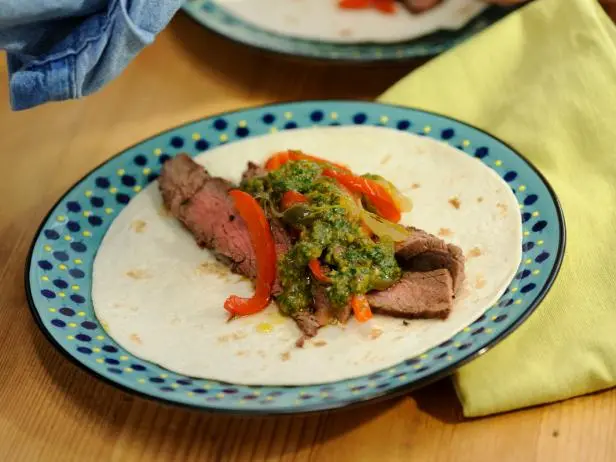 Flank Steak Fajitas with Chimichurri and Drunken Peppers Recipe | Sunny Anderson | Food Network