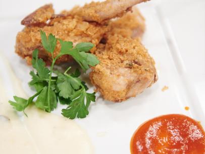 Finalist Eddie Jackson's dish, Salt and Vinegar Encrusted Quail with a Potato and White Cheddar Puree, for the Star Challenge, Improv, as seen on Food Network Star, Season 11.