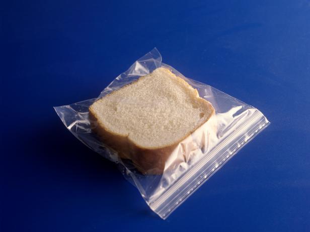 Portrait of a white bread sandwich in a plastic sandwich bag on a blue background (Photo by: Digital Light Source/UIG via Getty Images)