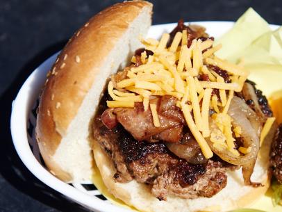 Finalists Jay Ducote and Arnold Myint's dishes Cajun Burger with Grilled Onions, Cheddar Cheese and Praline Bacon, and Ramen Bun Slider with Kimchi Ketchup and Pickled Ginger Relish, for the Star Challenge, Food Truck Showdown, as seen on Food Network Star, Season 11.