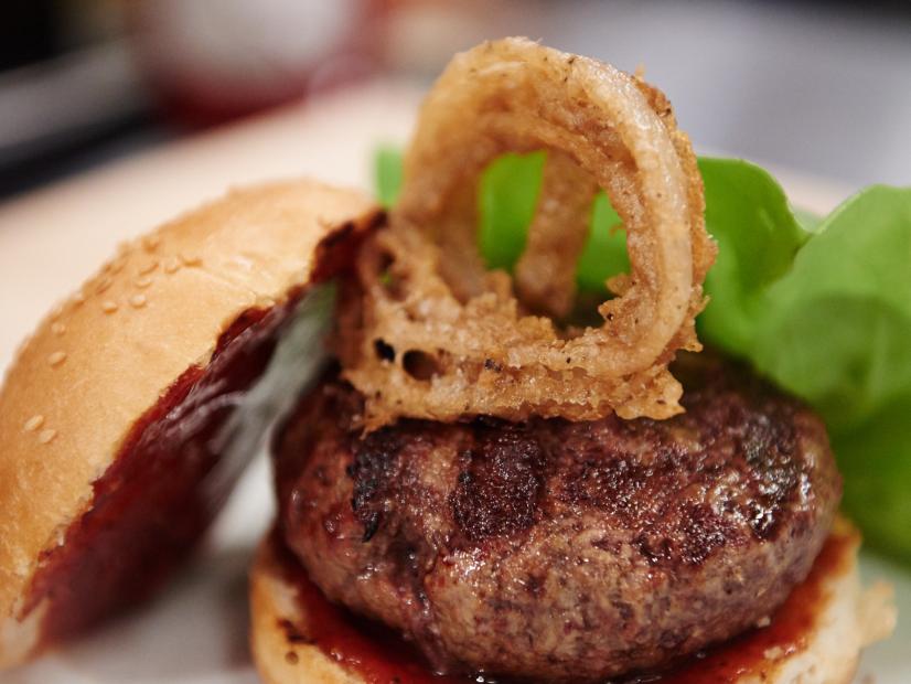 Finalist Eddie Jackson's dish, Burger Toppings: Caribbean Style Burger with Jerk Ketchup and Crispy Onion Rings, for the Mentor Challenge, Morning TV Segment, as seen on Food Network Star, Season 11.
