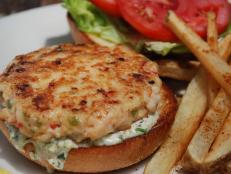 Savor fresh eats and a phenomenal view at this restaurant located alongside a marina. Curtis Stone was left impressed by the Shrimp Burger. This scrumptious creation stars a pan-seared shrimp patty finished with lettuce, tomato and a cool, lemony tartar sauce, then nestled in a toasted brioche bun.