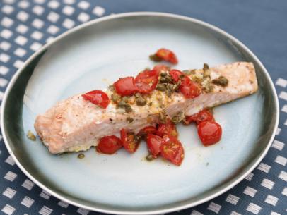 Grilled salmon, tomatoes and capers food beauty, as seen on Food Network’s The Kitchen, Season 6.