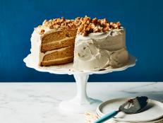 This recipe is for the peanut butter-obsessed. The cake itself is substantial but also tender. Be sure you don't skip the last 2 minutes of beating incorporating air into the butter-sugar-egg mixture makes the batter light. Spread a few tablespoons of raspberry jam on each cake layer along with the peanut butter for an easy PB&J upgrade!