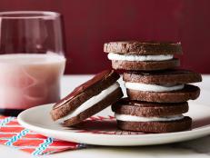 Leftover hot chocolate or cocoa mix transforms a regular sugar cookie recipe into a festive treat. To keep cookies nice and round when you set the dough log down in the freezer, here's a tip: Hang onto your next cardboard paper towel tube, cut through it with scissors to make an open trough, then rest the log in the makeshift cradle and freeze.