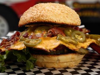 Proving that the Sacramento County Fair has some of the most unique food options around, Pam's Jalapeno Cheese Skirt Burger has both big visuals and big taste, as seen on Food Network's Carnival Cravings with Anthony Anderson, Season 1.
