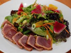 This beachside spot serves island-inspired bites like the Togarashi Ahi Tuna Salad. Curtis Stone loves this dish, which stars wild tuna coated in a Japanese seven-spice mix that includes paprika and orange zest. The fish is seared, then served with mixed greens and fresh add-ins like creamy avocado.