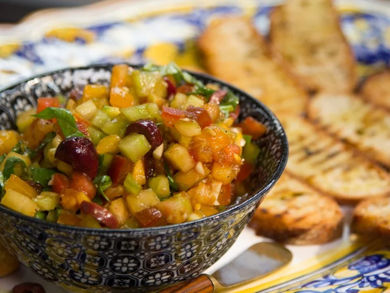 Heirloom tomato bruschetta with toasted bread, as prepared by host Valerie Bertinelli on Valerieâ  s Home Cooking.