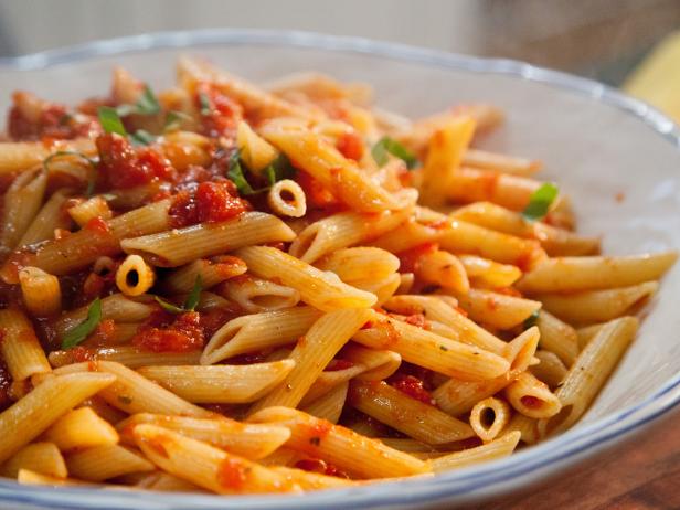 Spicy arrabiata penne, topped with fresh basil and parmesan as prepared by host Valerie Bertinelli on Valerieâ  s Home Cooking.