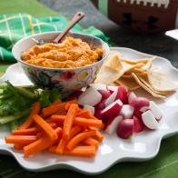 Roasted red pepper hummus with fresh veggies and pita chips, as prepared by host Valerie Bertinelli on Valerieâ  s Home Cooking.