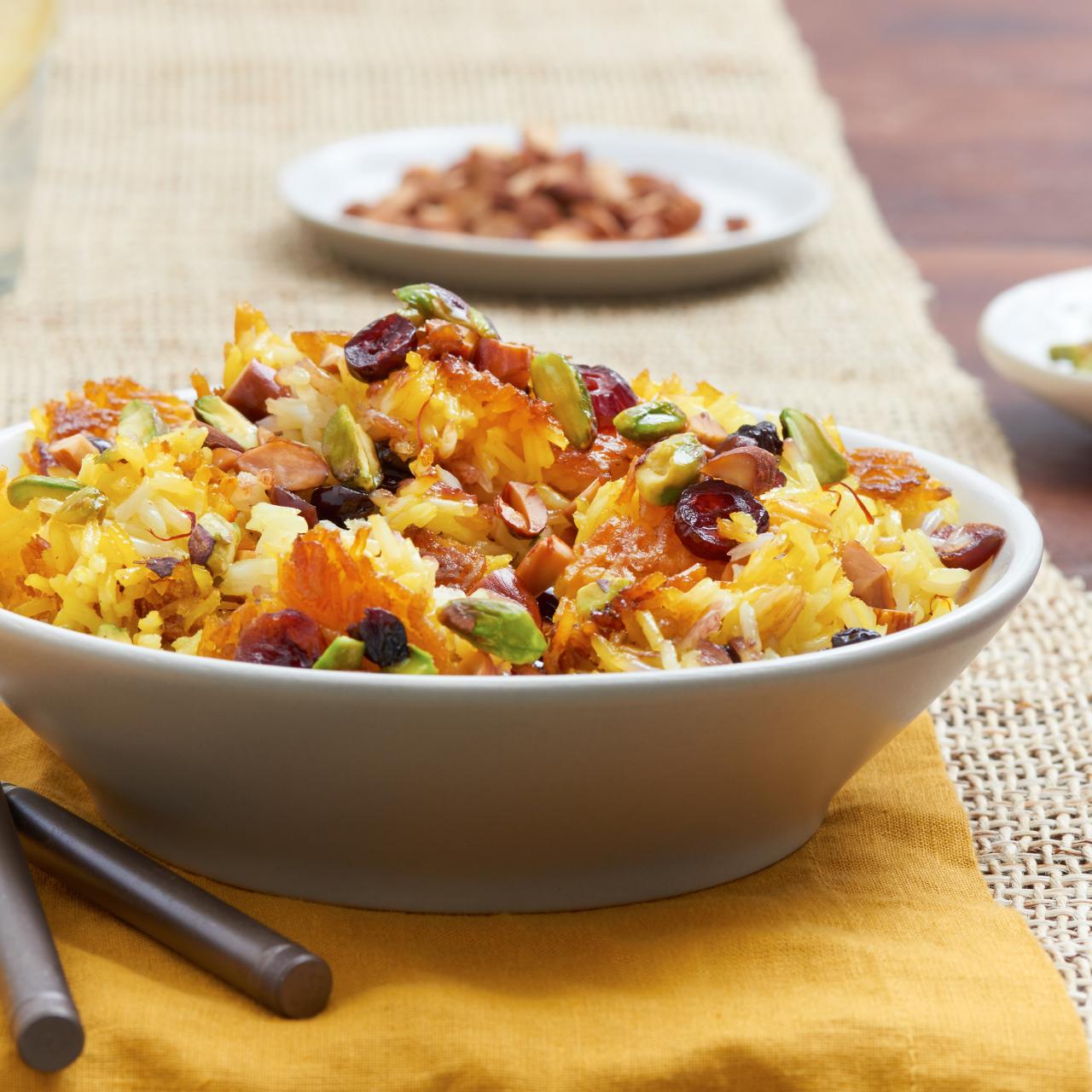 https://food.fnr.sndimg.com/content/dam/images/food/fullset/2015/8/26/2/RX-BEHR_Jeweled-Saffron-Rice-Pilaf-V2_s4x3.jpg.rend.hgtvcom.1280.1280.suffix/1440682569952.jpeg