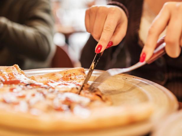 How You Eat a Slice of Pizza Reveals a Lot About Your Personality