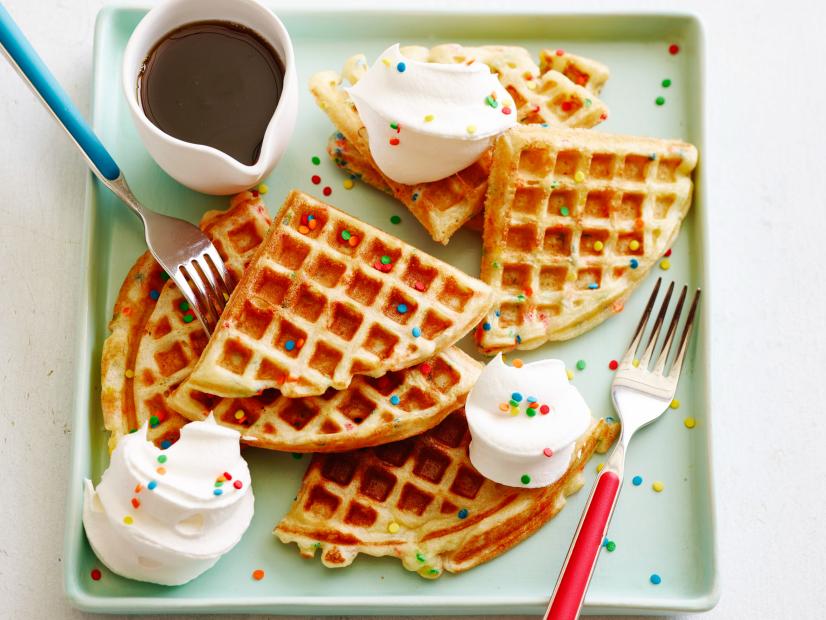FNK BIRTHDAY BELGIAN WAFFLES
Food Network Kitchen
Food Network
Milk, Dry Active Yeast, Unsalted Butter, Sugar, Eggs, Vanilla Extract, Fine Salt, Allpurpose
Flour, Confetti Sprinkles, Maple Syrup, Whipped Cream