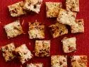 FNK MAGIC BARS
Food Network Kitchen
Food Network
Unsalted Butter, Graham Crackers, Sweetened Condensed Milk, Semisweet Chocolate Chips,
Butterscotch or Peanut Butter Chips, Pecans, Sweetened Coconut