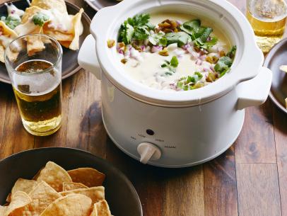 FNK QUESO DIP **Game Day/Super Bowl
Food Network Kitchen
Food Network
Cilantro, Red Onion, Pickled Jalapenos, Unsalted Butter, Allpurpose
Flour, Domestic Lager
Beer, Milk, Montery Jack Cheese, Chipotle Powder, Tortilla Chips