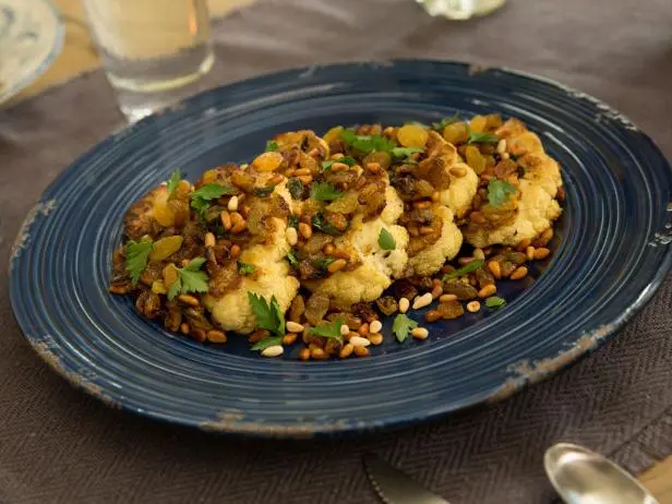 Roasted Cauliflower Steaks with Golden Raisins and Pine Nuts Recipe | Valerie Bertinelli | Food Netw
