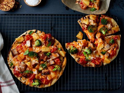 Grilled Hawaiian Pita Pizzas with Spiced Pork, Charred Broccoli and Cheddar