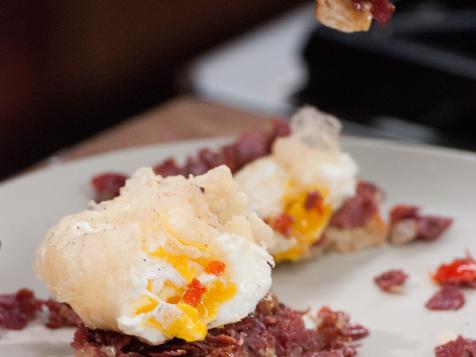 Crisp Tempura Poached Egg over English Muffin with Red Pepper Corned Beef Hash