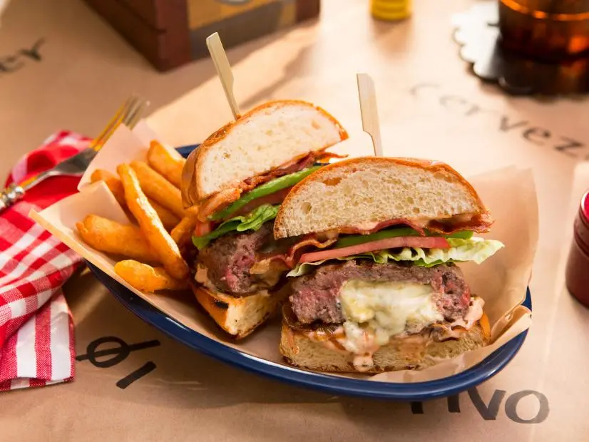 Tiffani's Ultimate Lux Burgers prepared by host Tiffani Amber Theissen for Burgers and Beer night, as seen on Cooking Channel's Dinner at Tiffani's, Season 2.