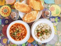 can't decide between red or white menudo? Get small bowls of both at Teresa's Mosiac Cafe. Served with the traditional toppings; green onions, chilitepin, Mexican Oregano and lemon, with toasted bolillos rolls for dipping,  One of our iconic Arizona dishes and the restaurants that serve them. Food photography and article by Jackie Alpers for the Food Network.