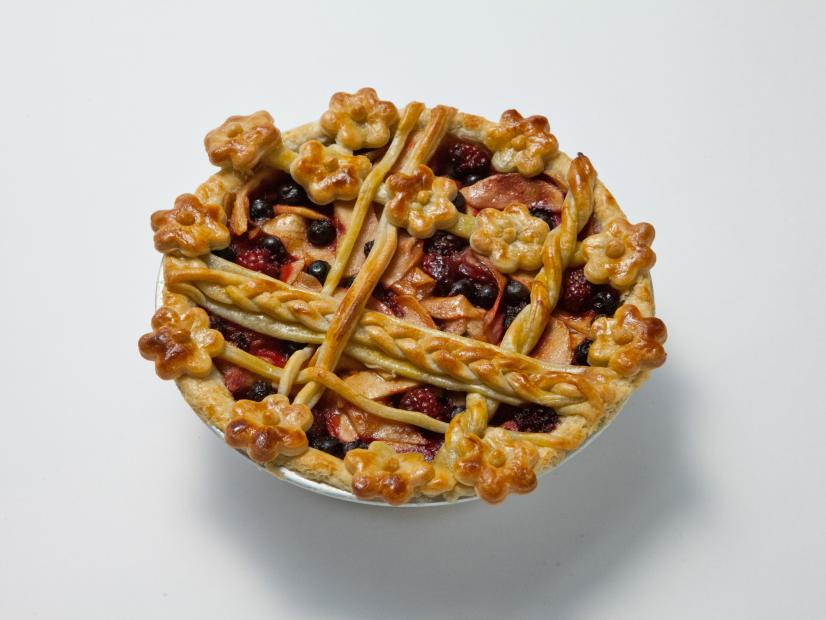 Host Lorraine Pascale's County Fair Pie made with an apple, blackberry, and blueberry filling, as seen on Food Network's Worst Bakers In America, Season 1.