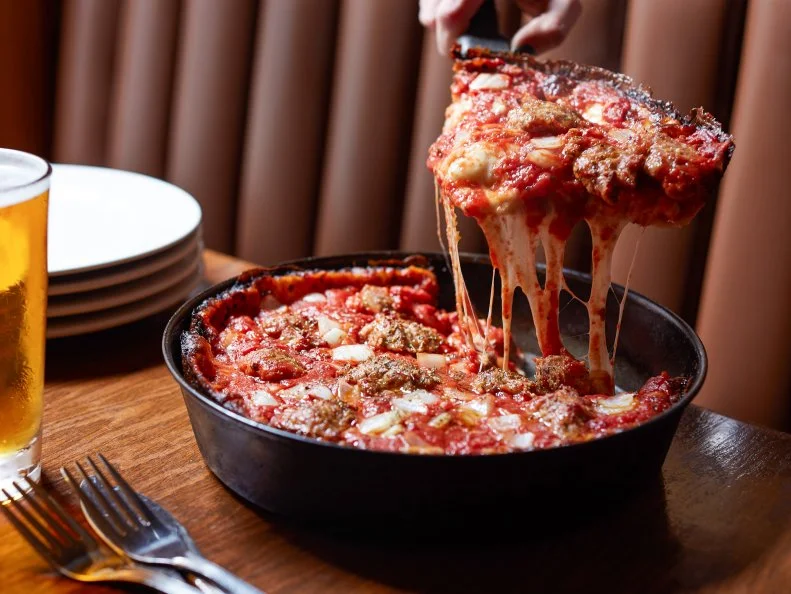 Sausage and White Onion Pan Pizza at Pequod's Pizza