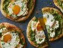Bobby Flay's Breakfast Pizza with Zucchini Pesto, Provolone, Smoked Ricotta and Olive Oil Fried Egg as seen on Brunch at Bobby's.
