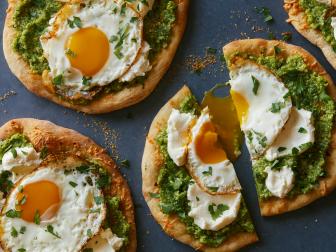 Bobby Flay's Breakfast Pizza with Zucchini Pesto, Provolone, Smoked Ricotta and Olive Oil Fried Egg as seen on Brunch at Bobby's.