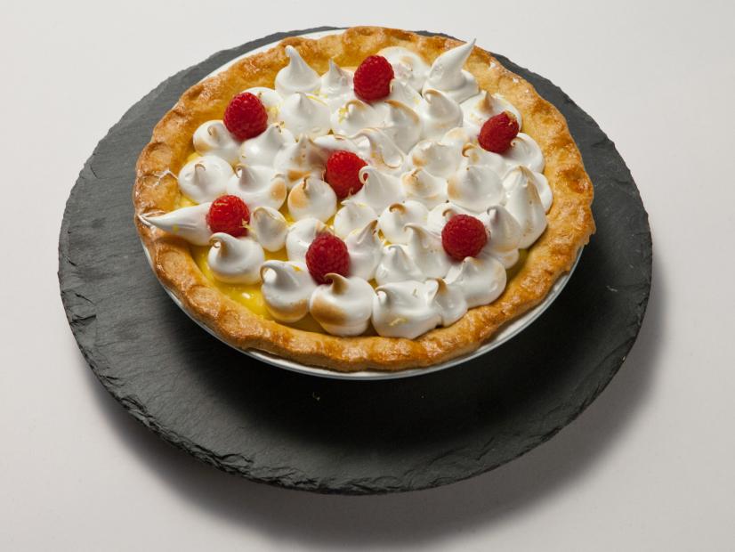 The Lemon Mirengue Pie made by finalist Carla Johnson for the final episode and challenge of Worst Bakers In America.  Carla used a lemon cream filling with a whip cream topping and rasberrys on top, as seen on Food Network's Worst Bakers In America, Season 1.