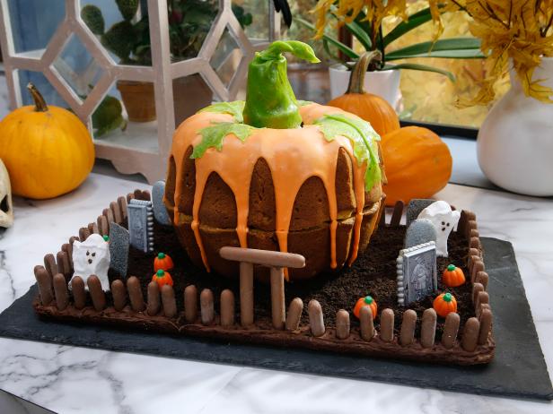 A Pumpkin Cake is displayed as seen on Food Network's The Kitchen, Season 11.