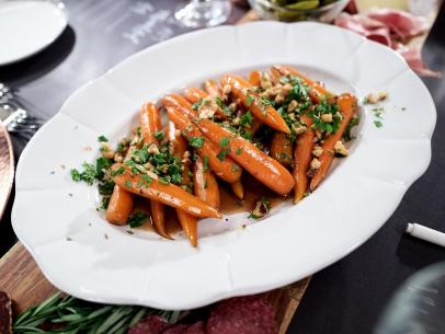 Smokey Candied Carrots with Walnut Gremolata, as seen on Food Network's Giada's Holiday Handbook, Season 2.