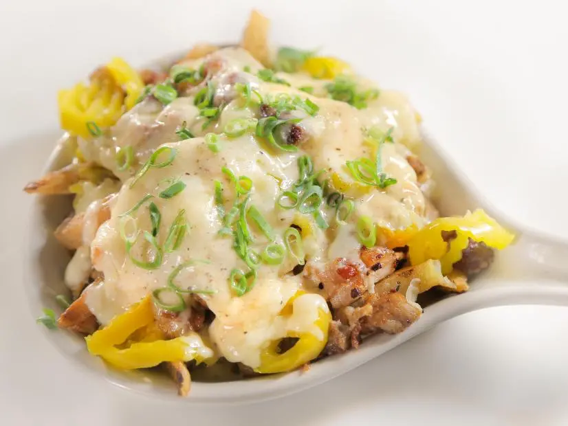 Pork Belly Disco Cheese Fries as prepared by Rocky Hill Inn in Rocky Hill, NJ as seen on Food Network's Diners, Drive-Ins and Dives episode 2509.