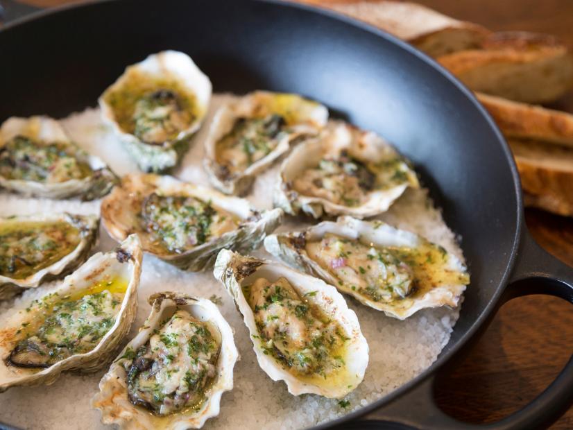 Grilled oysters with butter and garlic sauce, as prepared by host Sarah Sharratt on Cooking Channel series, UpRooted.