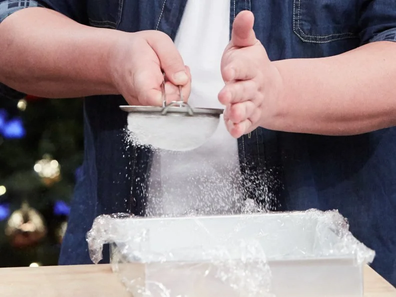 Host Duff Goldman preparing his dish, Homemade S'Mores, as seen on Food Network's Holiday Baking Championship: Duff's Sweet Spot, Season 3.