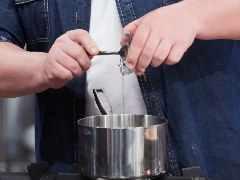 Host Duff Goldman preparing his dish, Homemade S'Mores, as seen on Food Network's Holiday Baking Championship: Duff's Sweet Spot, Season 3.