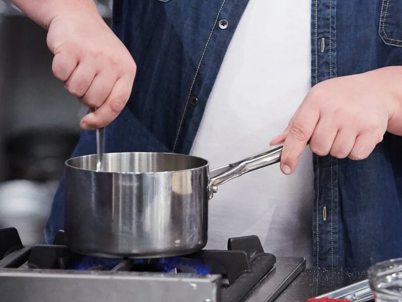 Host Duff Goldman preparing his dish, Homemade S'Mores, as seen on Food Network's Duff's Sweet Spot, Season 3.